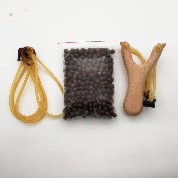 White slingshot + 500 mudballs + 2 bands